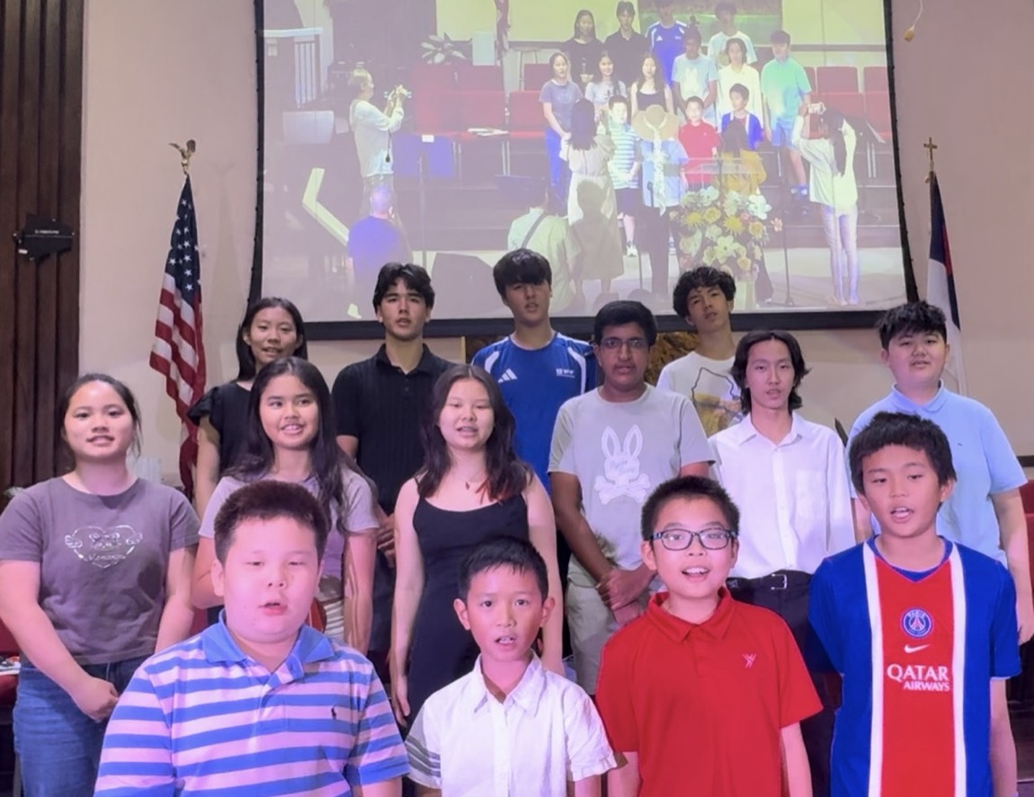 OCAPEX student musicians posing for a group photo after a performance