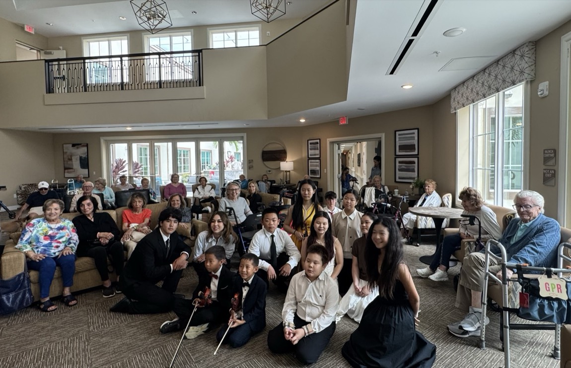 OCAPEX students and community members gathered together after a visit